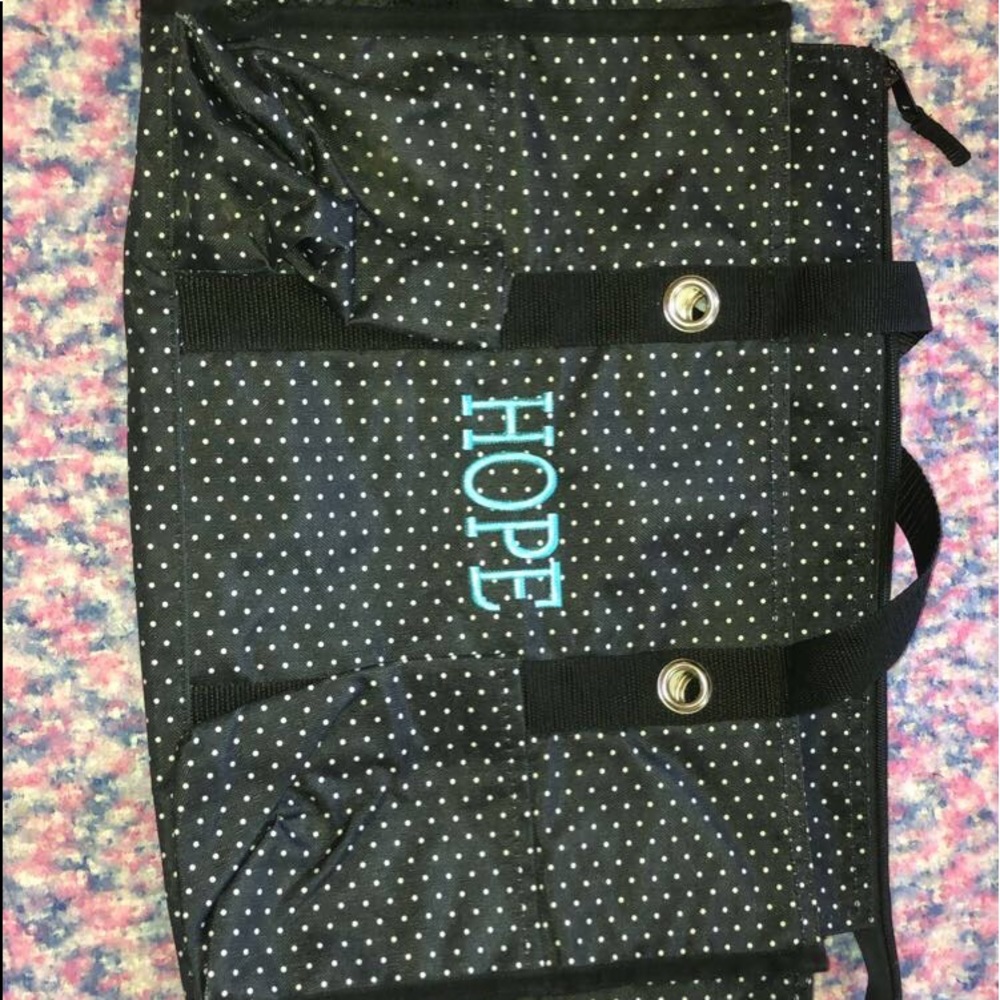 M tote bag; black/white dots, blue letters HOPE embroidered across the front